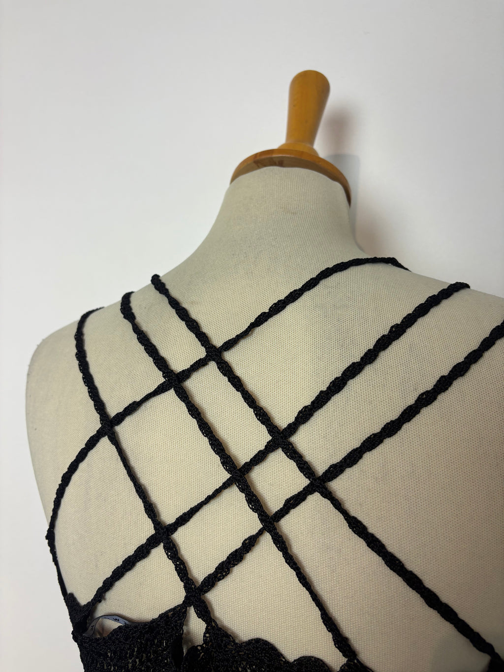 Handmade black crochet beaded cross-strap top