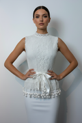 Handmade white crochet tie-up sleeveless top with tassel pom-poms