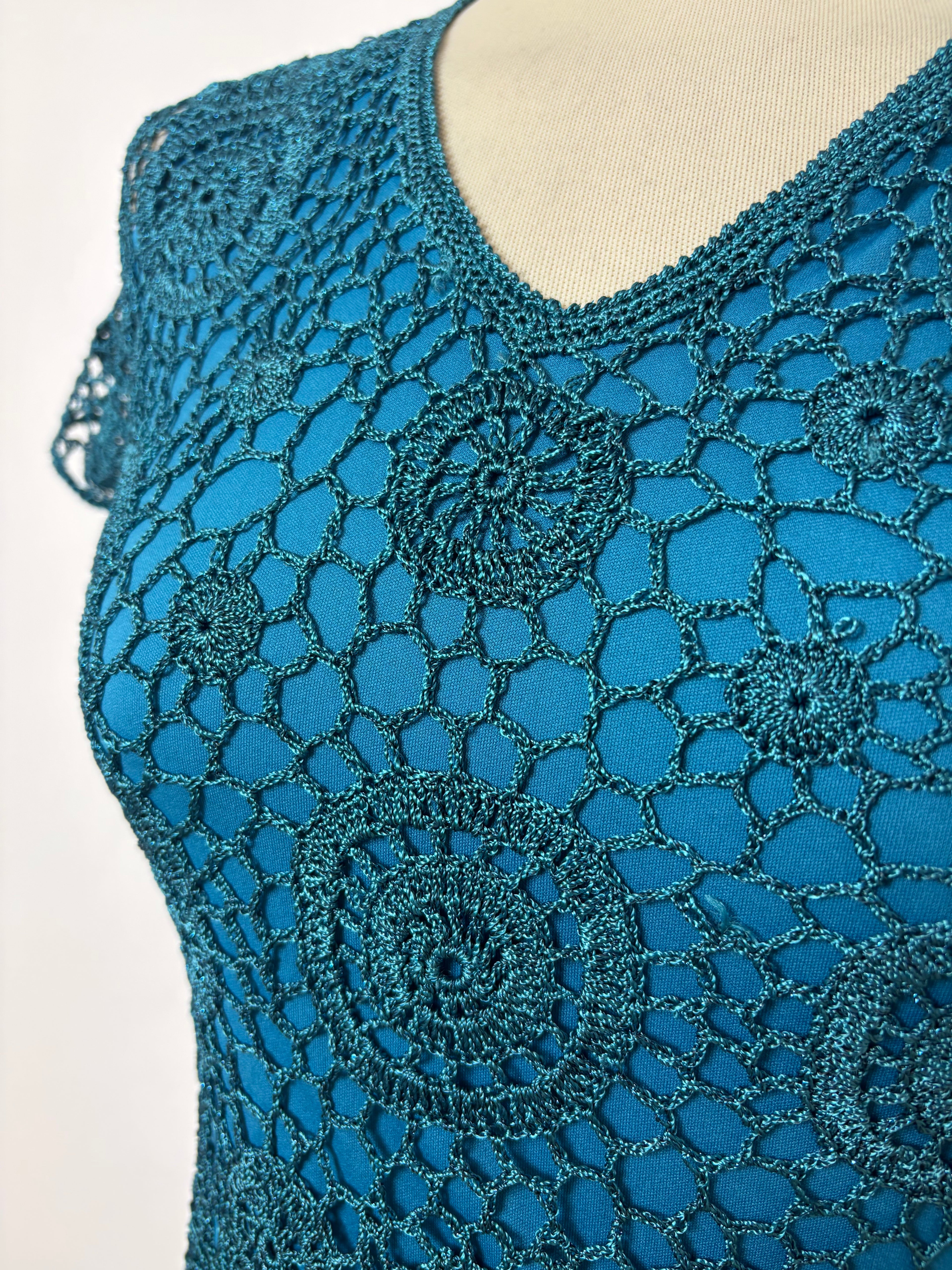 Handmade turquoise crochet lined short-sleeved sparkly top