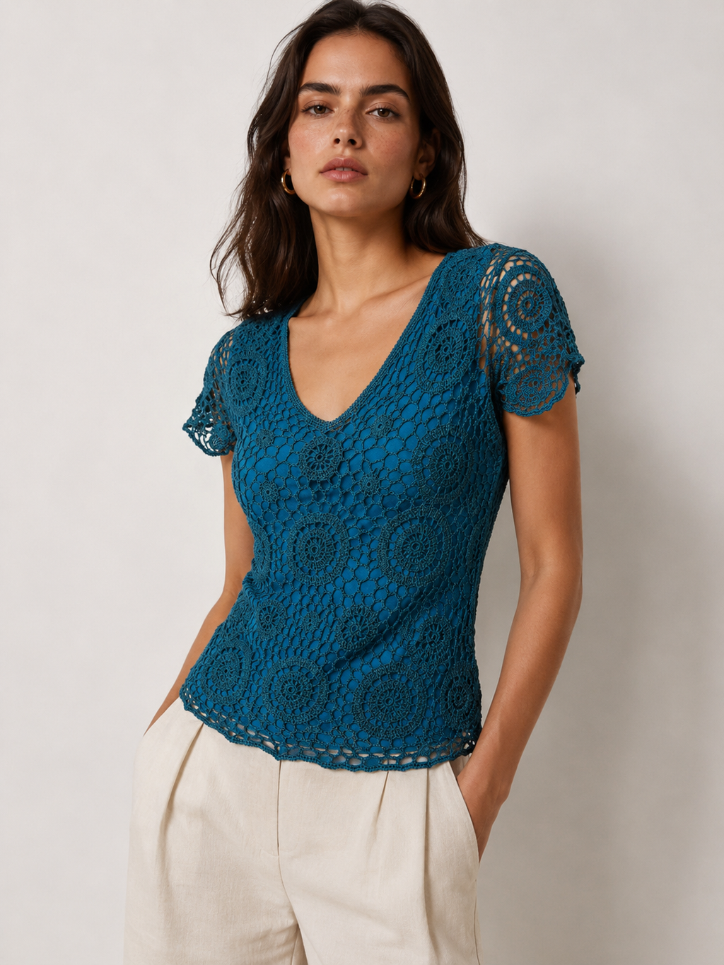 Handmade turquoise crochet lined short-sleeved sparkly top