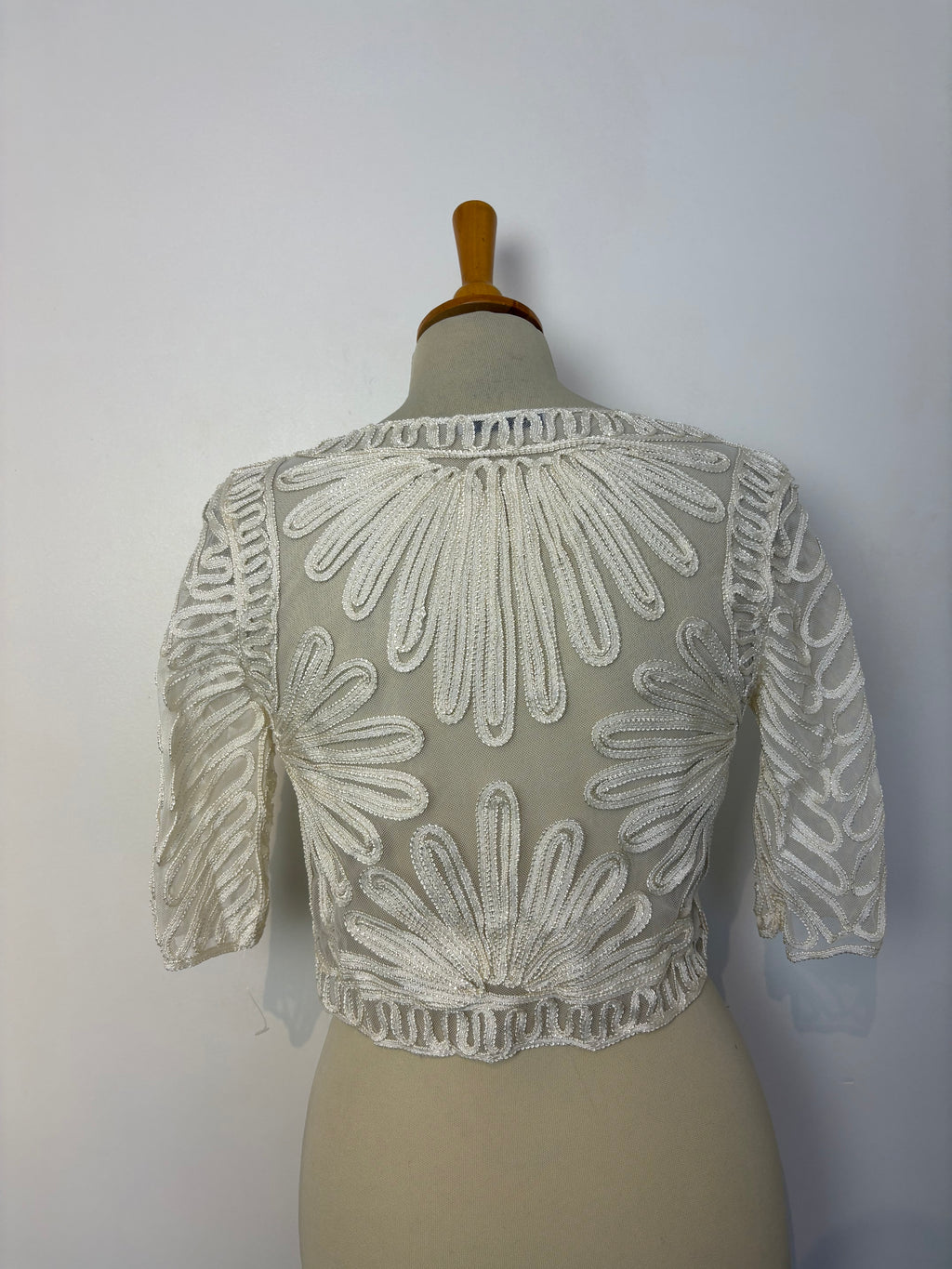 Ivory mesh cornelli-patterned tie-up bolero