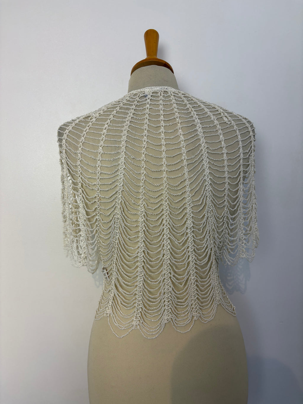 Handmade ivory crochet beaded tie-up bolero