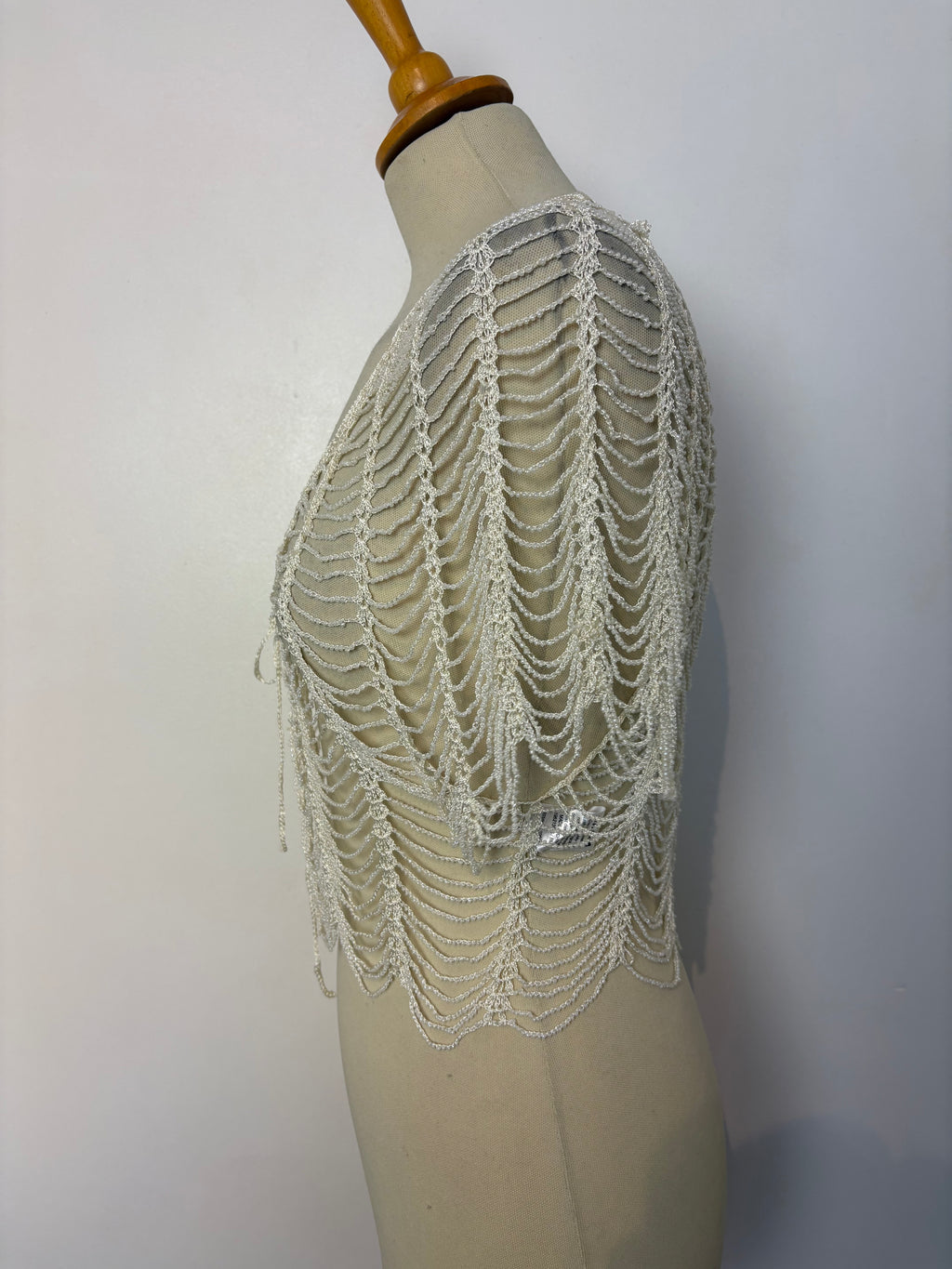 Handmade ivory crochet beaded tie-up bolero