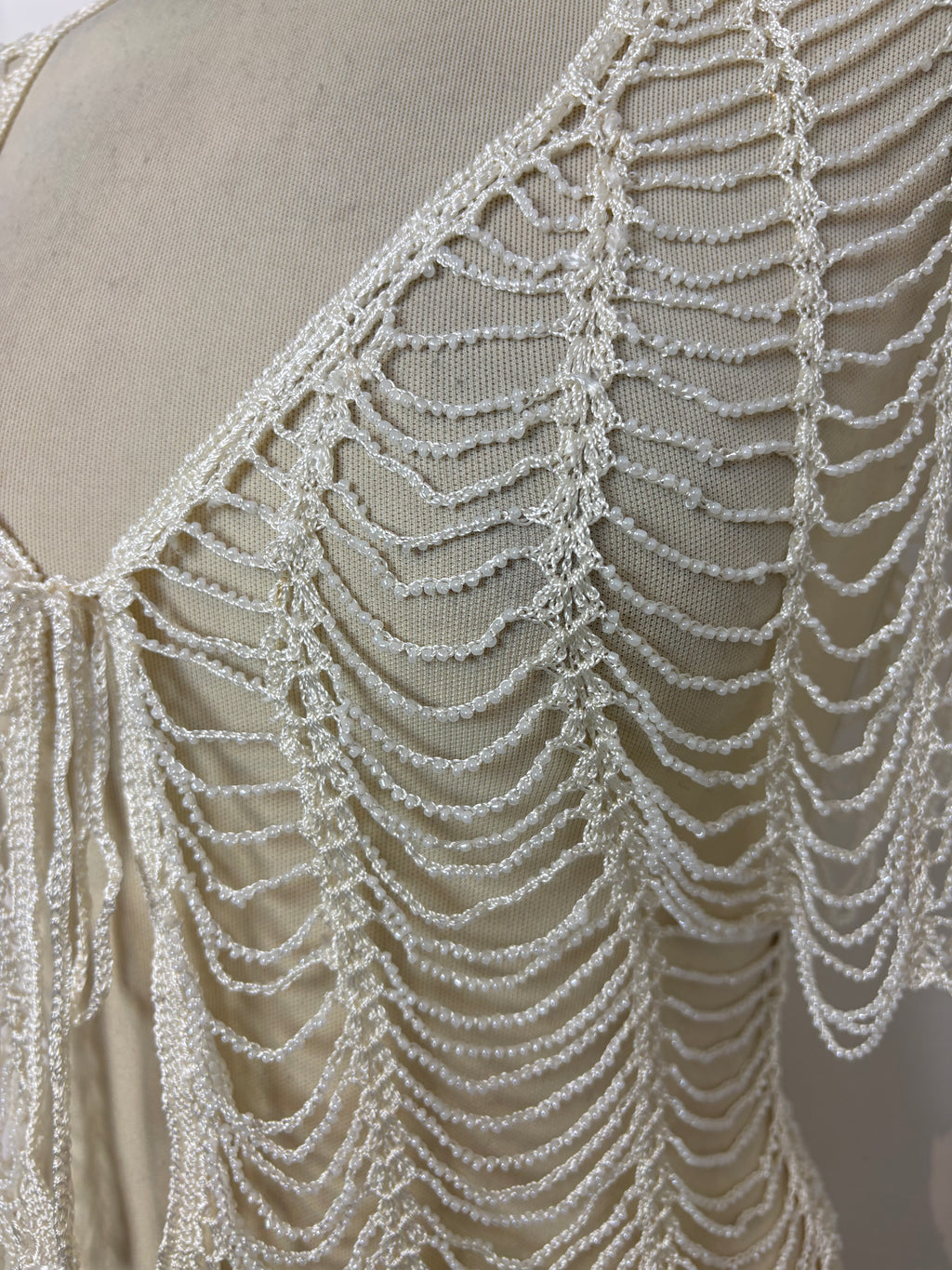 Handmade ivory crochet beaded tie-up bolero