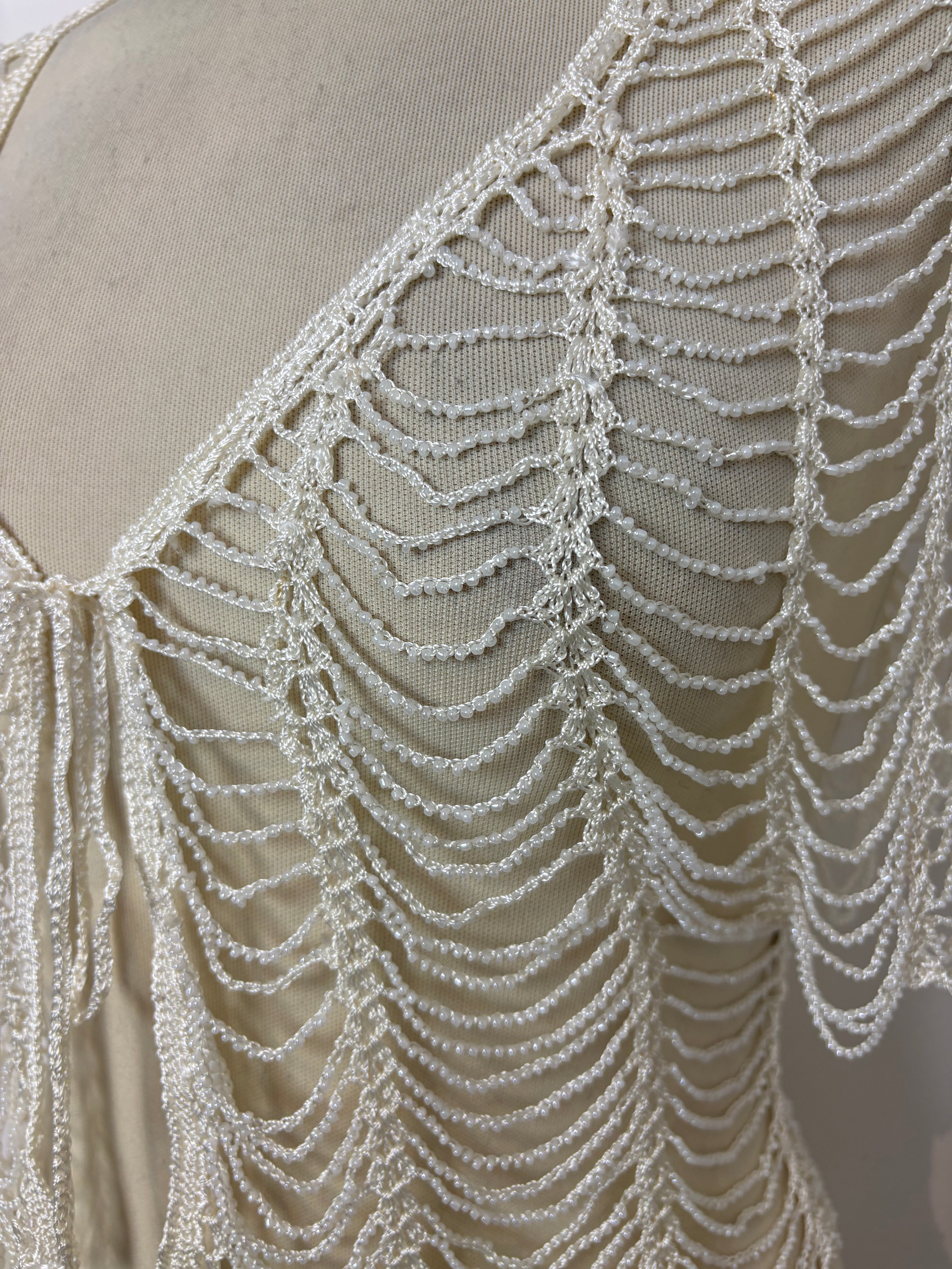 Handmade ivory crochet beaded tie-up bolero