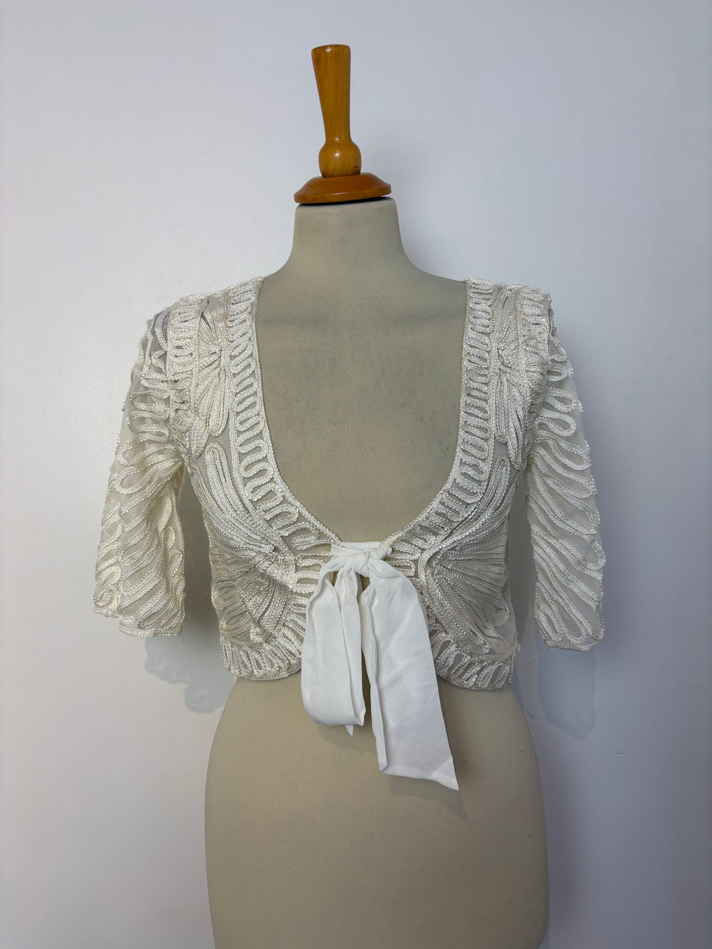 Ivory mesh cornelli-patterned tie-up bolero