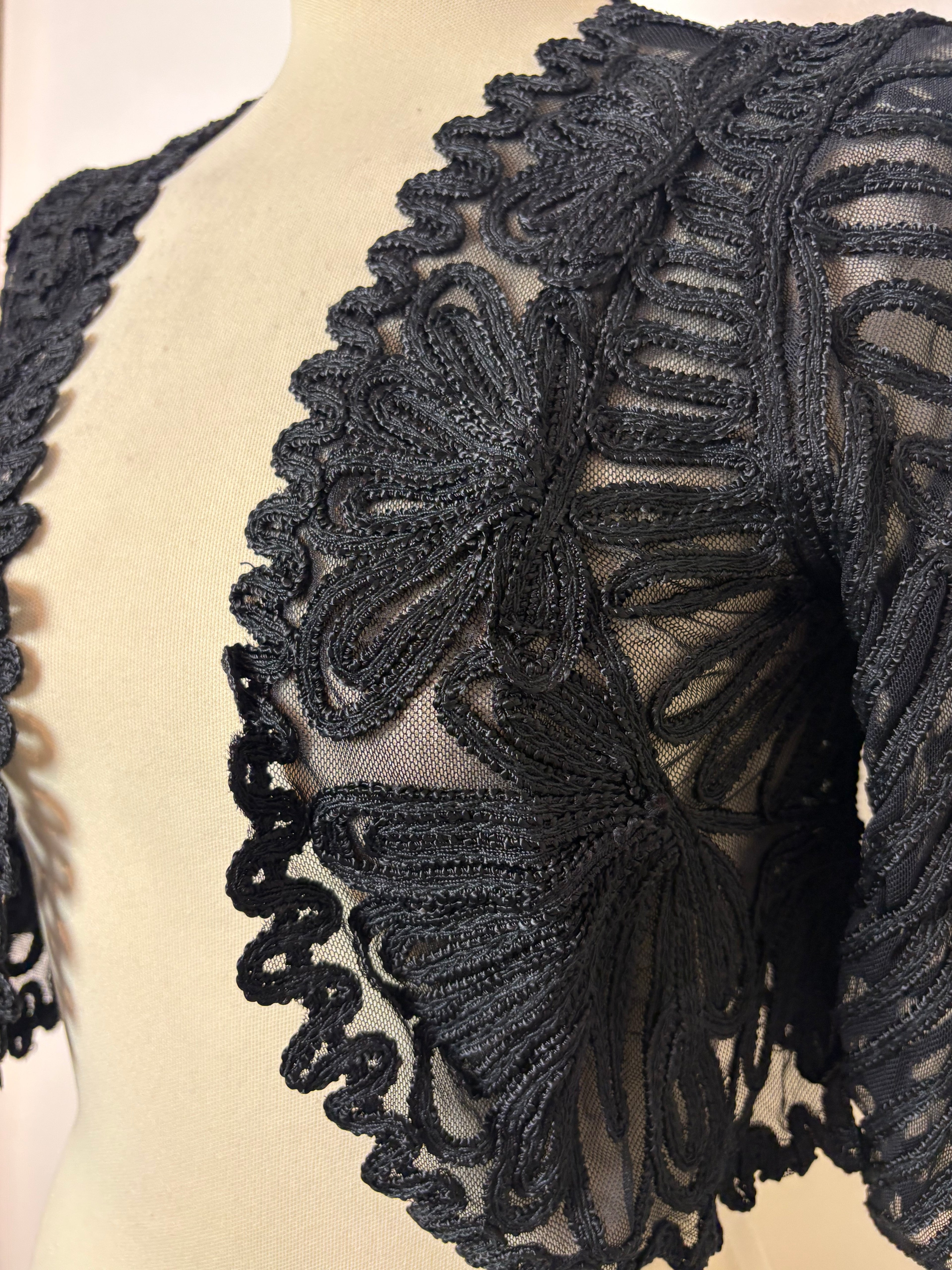 Black mesh cornelli-patterned bolero